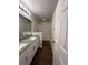 Bathroom with granite countertops, double sinks, and a shower/tub combo at 572 Cresting Oak Cir # 19, Orlando, FL 32824