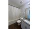 Bathroom with shower/tub combo, granite vanity, and tile floor at 572 Cresting Oak Cir # 19, Orlando, FL 32824