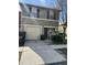 Two-story house with attached garage and landscaping at 572 Cresting Oak Cir # 19, Orlando, FL 32824