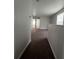Hallway with carpeted floors leading to bedrooms at 572 Cresting Oak Cir # 19, Orlando, FL 32824