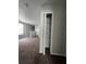 Home hallway with a linen closet and carpeting at 572 Cresting Oak Cir # 19, Orlando, FL 32824