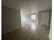 Spacious living area with tile floors and natural light at 572 Cresting Oak Cir # 19, Orlando, FL 32824