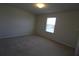 Simple bedroom with carpeted floor and neutral wall at 684 Bishop Bay Loop, Apopka, FL 32712