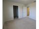 Spacious bedroom with carpeted floor and walk-in closet at 684 Bishop Bay Loop, Apopka, FL 32712