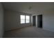 Empty bedroom with carpet, neutral walls, and a closet at 684 Bishop Bay Loop, Apopka, FL 32712