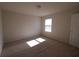 Bright bedroom featuring carpeted floors and a window with blinds at 684 Bishop Bay Loop, Apopka, FL 32712
