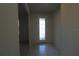 Elegant entryway with tiled floor and decorative door at 684 Bishop Bay Loop, Apopka, FL 32712