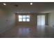 Spacious living room with tile flooring and lots of natural light at 684 Bishop Bay Loop, Apopka, FL 32712