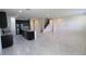 Open concept living area with kitchen and staircase at 684 Bishop Bay Loop, Apopka, FL 32712