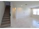 Interior view showing a carpeted staircase leading to the upper level at 684 Bishop Bay Loop, Apopka, FL 32712