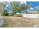Backyard with a large grassy area and privacy fence at 7201 Pleasant Dr, Orlando, FL 32818