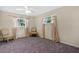 Spacious bedroom with ceiling fan and neutral decor at 7201 Pleasant Dr, Orlando, FL 32818