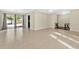 Large living area with tile floors and access to patio at 7201 Pleasant Dr, Orlando, FL 32818