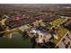 Aerial view of community with resort-style pool, tennis courts, and playground at 8931 Bismarck Palm Rd, Kissimmee, FL 34747