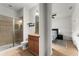 Clean bathroom with shower, toilet, and granite countertop at 8931 Bismarck Palm Rd, Kissimmee, FL 34747