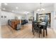 Open concept dining room and kitchen with modern finishes at 8931 Bismarck Palm Rd, Kissimmee, FL 34747