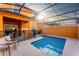 Private screened pool and patio with seating at 8931 Bismarck Palm Rd, Kissimmee, FL 34747