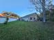 Large backyard with grassy area at 1022 Bartlett Ct, Oviedo, FL 32765