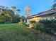 Large backyard with solar panels and a swing set at 1022 Bartlett Ct, Oviedo, FL 32765