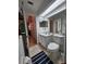 Simple bathroom with a toilet and sink vanity at 1022 Bartlett Ct, Oviedo, FL 32765
