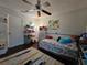 bedroom with a single bed, and a world map on the wall at 1022 Bartlett Ct, Oviedo, FL 32765