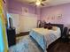 Bright bedroom with a queen-size bed and large closet at 1022 Bartlett Ct, Oviedo, FL 32765