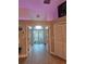 Bright entryway with french doors leading to a patio at 1022 Bartlett Ct, Oviedo, FL 32765
