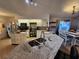 Spacious kitchen with granite island, double sink, and ample cabinet space at 1022 Bartlett Ct, Oviedo, FL 32765