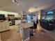 Open concept kitchen with island, granite counters and stainless steel appliances at 1022 Bartlett Ct, Oviedo, FL 32765