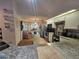 Modern kitchen with granite counters, stainless steel appliances, and island at 1022 Bartlett Ct, Oviedo, FL 32765