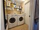 Bright laundry room, washer, dryer, and ample storage at 1022 Bartlett Ct, Oviedo, FL 32765