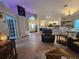 Open concept living room with kitchen view at 1022 Bartlett Ct, Oviedo, FL 32765