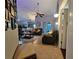 Open living room with comfortable seating and view to kitchen at 1022 Bartlett Ct, Oviedo, FL 32765