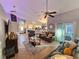 Open living room with a view of the kitchen at 1022 Bartlett Ct, Oviedo, FL 32765