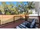 Relaxing deck with seating area overlooks a fenced backyard at 1441 Dann St, Orlando, FL 32804