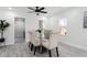 Bright dining area with a glass table and upholstered chairs at 1441 Dann St, Orlando, FL 32804