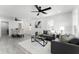 Open concept living and dining area with gray sofas and dining set at 1441 Dann St, Orlando, FL 32804