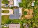 Aerial view of a house and a large vacant lot next to it at 2533 Edgewater Ave, New Smyrna Beach, FL 32168