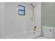 Clean bathroom with a shower/tub combo at 2533 Edgewater Ave, New Smyrna Beach, FL 32168
