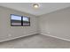 Simple bedroom with neutral walls and carpet flooring at 2533 Edgewater Ave, New Smyrna Beach, FL 32168