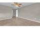 Large bedroom with ceiling fan and access to bathroom at 2533 Edgewater Ave, New Smyrna Beach, FL 32168