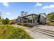 House exterior, gray painted siding, and sunroom addition at 2533 Edgewater Ave, New Smyrna Beach, FL 32168