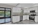 Updated kitchen, granite countertops, stainless steel appliances at 2533 Edgewater Ave, New Smyrna Beach, FL 32168