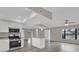 Modern kitchen with stainless steel appliances and white cabinets at 2533 Edgewater Ave, New Smyrna Beach, FL 32168
