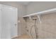 Laundry room with built-in shelving and hookups at 2533 Edgewater Ave, New Smyrna Beach, FL 32168