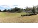 Large grassy backyard with plenty of space for outdoor activities at 3449 Michigan St, Lake Mary, FL 32746