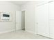 Bright bedroom with mirrored wall and double doors at 3449 Michigan St, Lake Mary, FL 32746