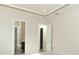 Spacious bedroom with access to bathroom and walk-in closet at 3449 Michigan St, Lake Mary, FL 32746