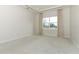 Bright bedroom with large window and neutral decor at 3449 Michigan St, Lake Mary, FL 32746
