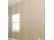 Simple bedroom with neutral wall colors and carpet flooring at 3449 Michigan St, Lake Mary, FL 32746